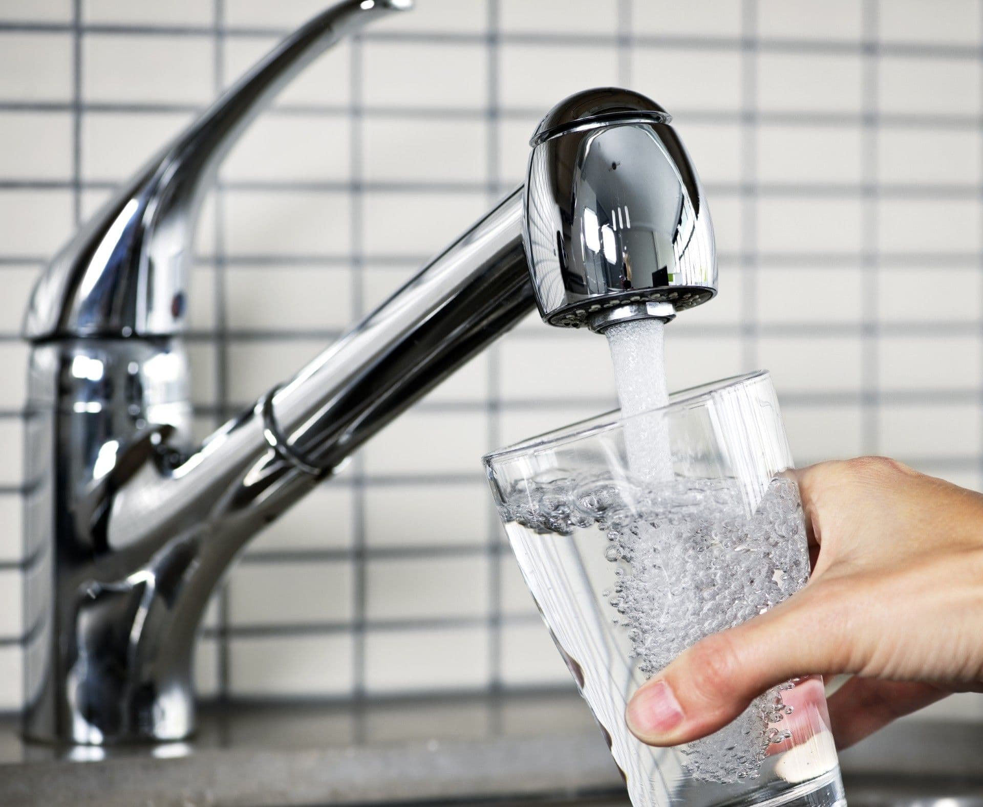 Water Flowing from a Faucet